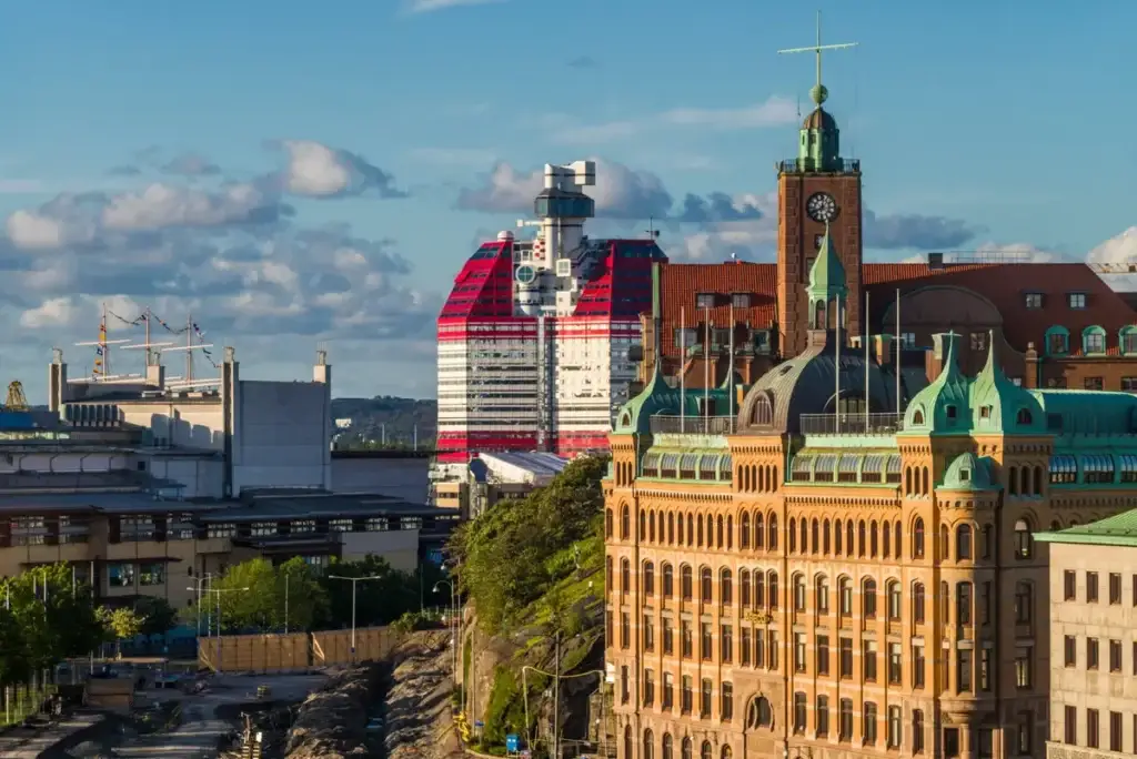 Sunset view of Gothenburg skyline with prominent The Lipstick building, showcasing Sweden's architectural diversity and urban charm in Vastragotland and Bohuslan.