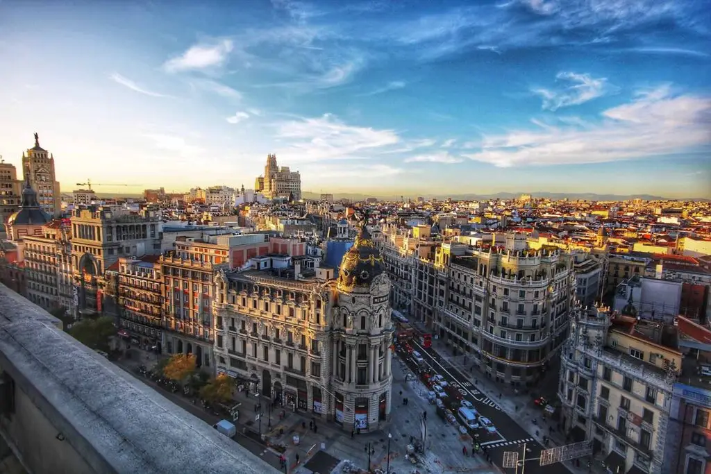 Breathtaking panoramic view of Madrid at sunset highlighting the city’s iconic architecture and bustling streets, perfect for tourism and travel enthusiasts interested in exploring Spain