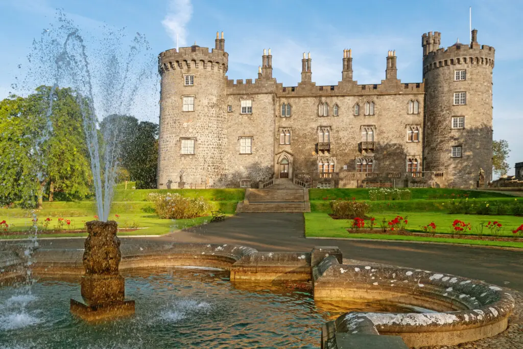 Historic Kilkenny Castle with fountain and gardens in Kilkenny, Ireland, a popular tourist attraction and heritage site on Europe Private Tours