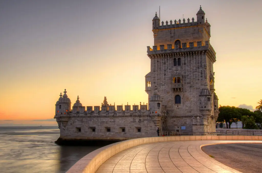 Belem Tower in Lisbon Portugal at sunset overlooking the Tagus River, a famous UNESCO World Heritage Site and top tourist attraction in Portugal