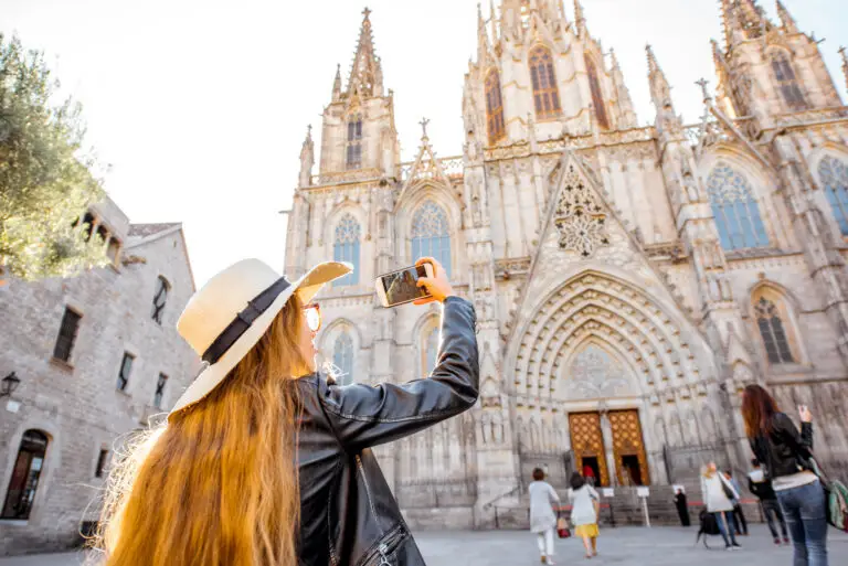 Tourist taking photo of the Barcelona Cathedral in the Gothic Quarter, Barcelona Spain during a private sightseeing tour
