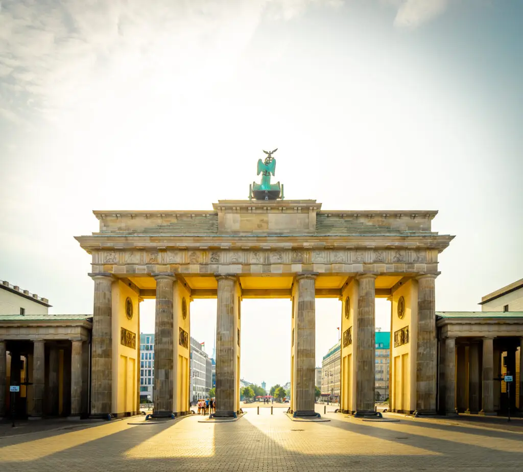 Brandenburg Gate in Berlin Germany at sunrise, iconic neoclassical monument and popular tourist attraction in Europe