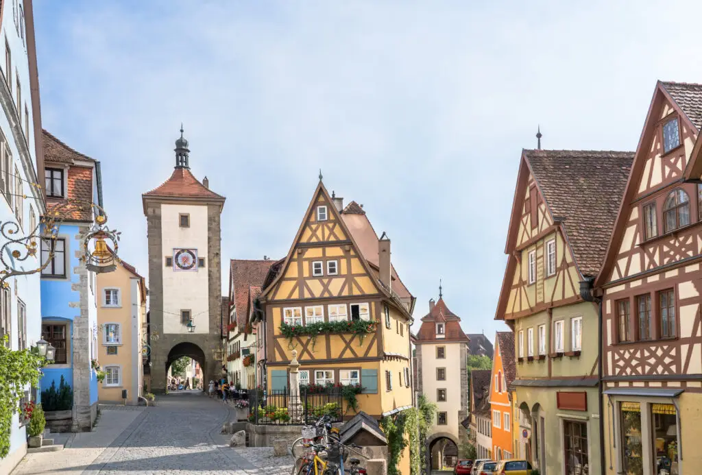 Colorful medieval half-timbered houses and cobblestone street in Rothenburg ob der Tauber, a famous historic town in Bavaria, Germany, popular European travel destination