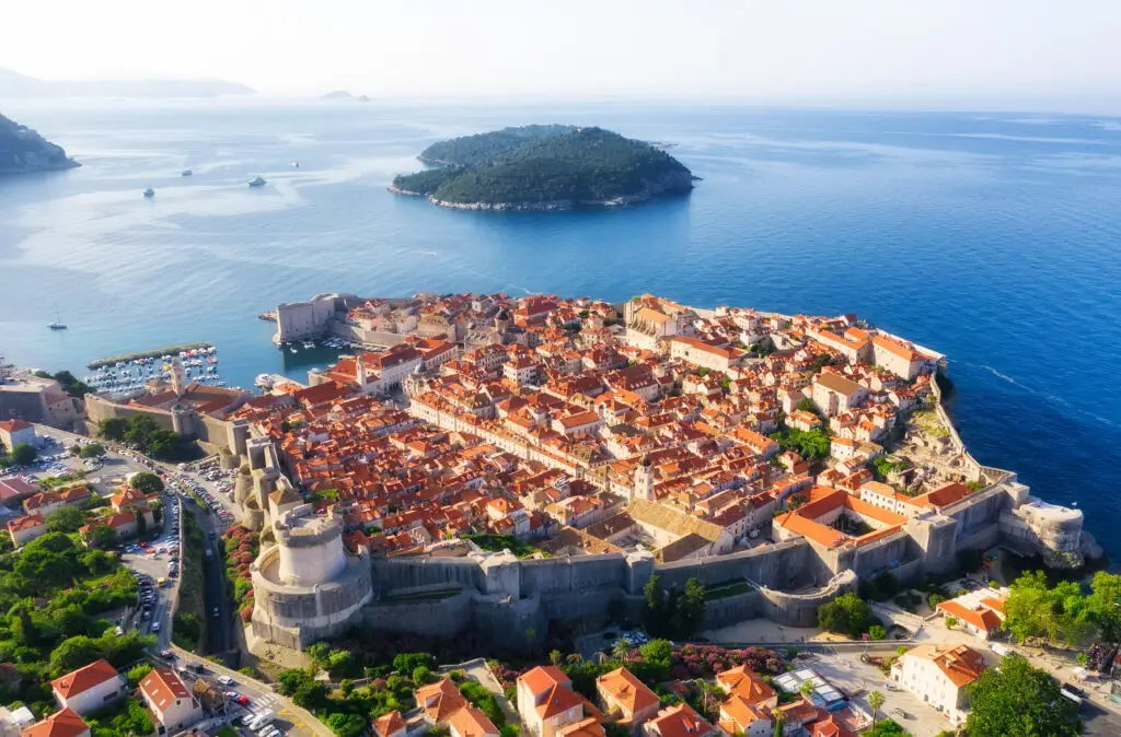 Aerial view of Dubrovnik Old Town in Croatia surrounded by ancient city walls and the Adriatic Sea, popular European vacation and sightseeing destination