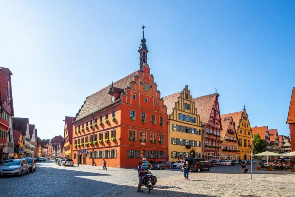 Colorful medieval buildings in the Old City of Dinkelsbühl, Bavaria, Germany, showcasing traditional architecture and cobblestone streets popular with tourists on European private tours