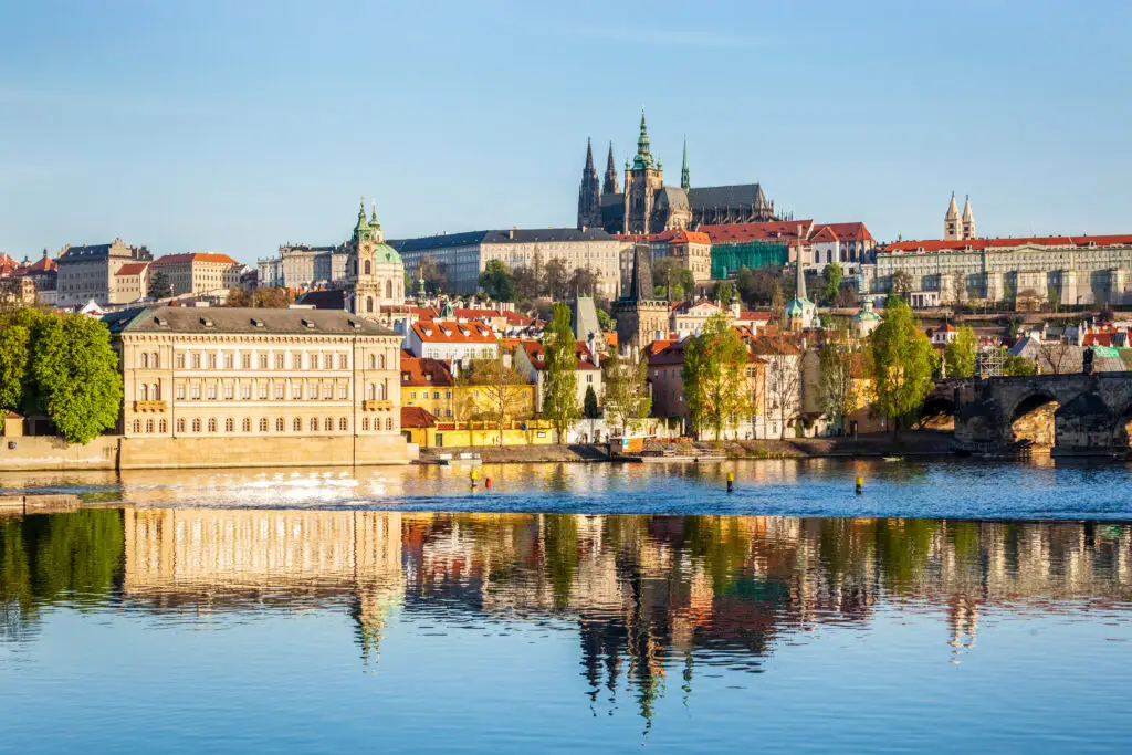 View of Prague Castle and the Vltava River with historic architecture in Prague, Czech Republic