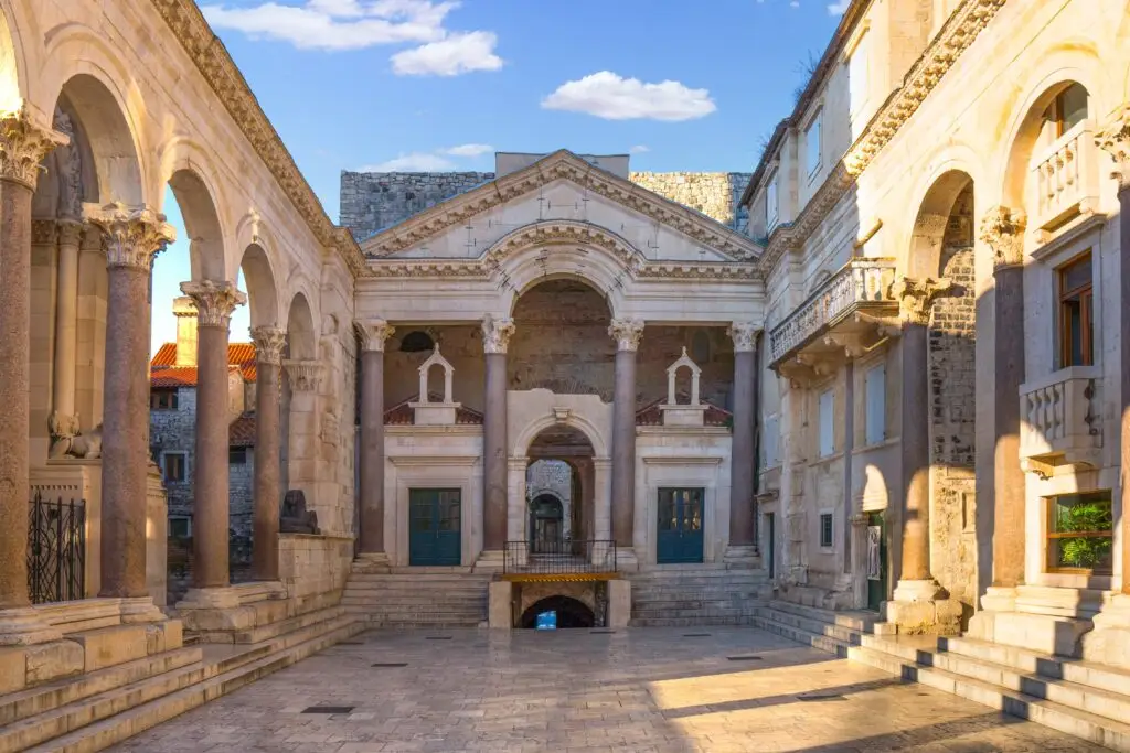 Diocletian's Palace Peristyle in Split Croatia showcasing ancient Roman architecture and historic stone columns under a bright blue sky