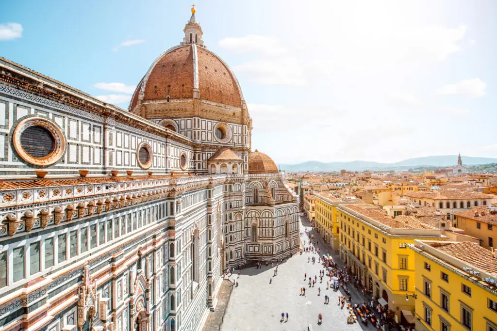 Aerial view of Florence Cathedral Duomo and historic city center in Florence, Italy, popular tourist destination for private tours in Tuscany